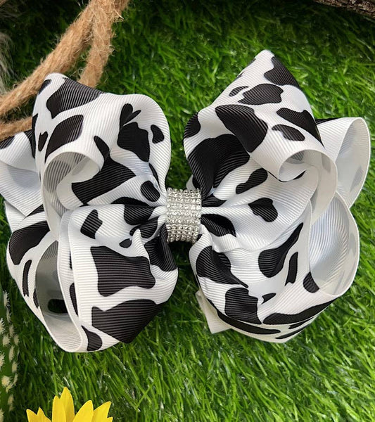 BLACK & WHITE COW SPOTED HAIR BOW. 7.5"