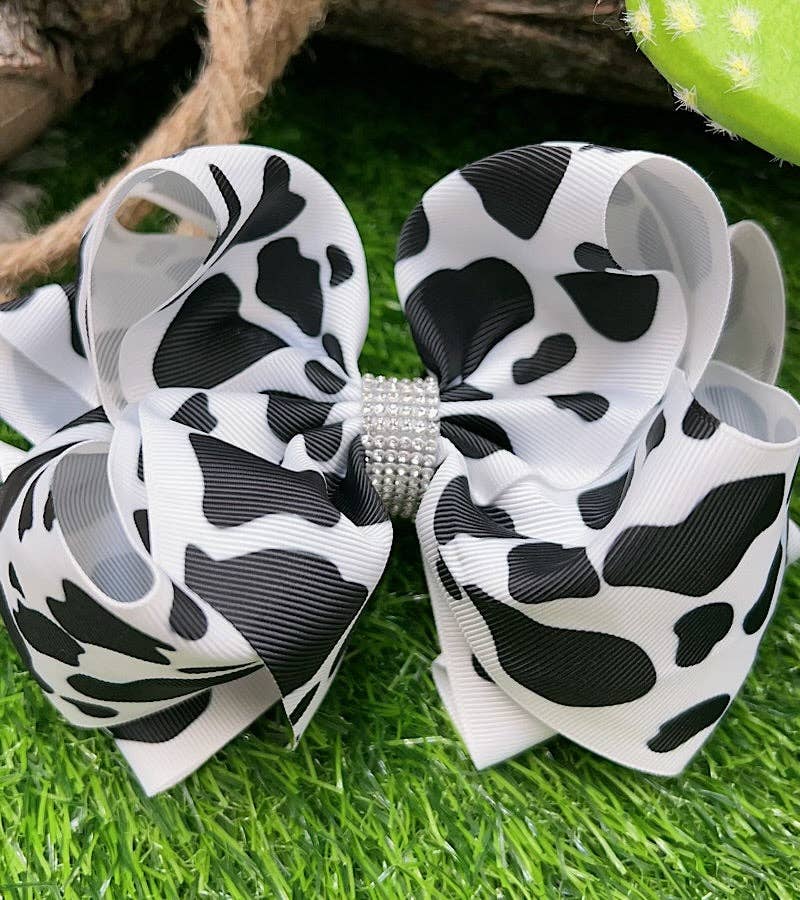 BLACK & WHITE COW SPOTED HAIR BOW. 7.5"