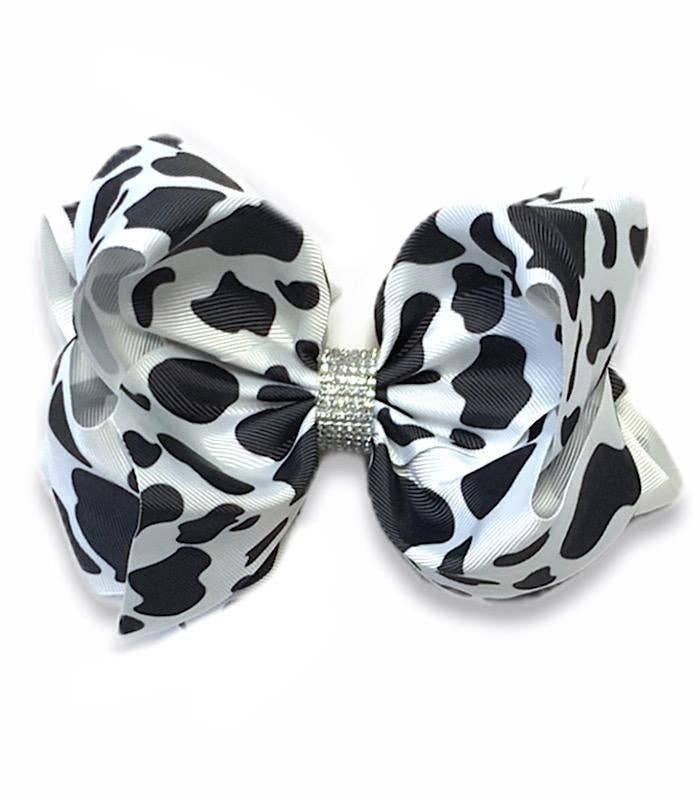 BLACK & WHITE COW SPOTED HAIR BOW. 7.5"