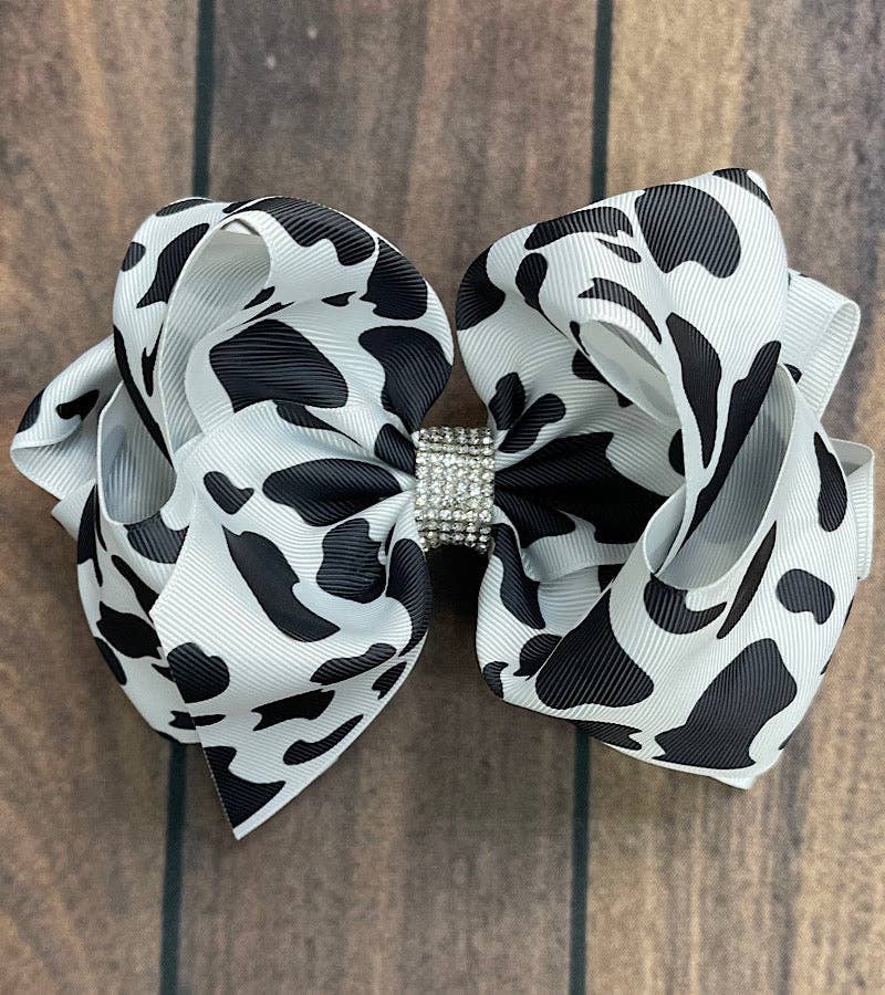 BLACK & WHITE COW SPOTED HAIR BOW. 7.5"