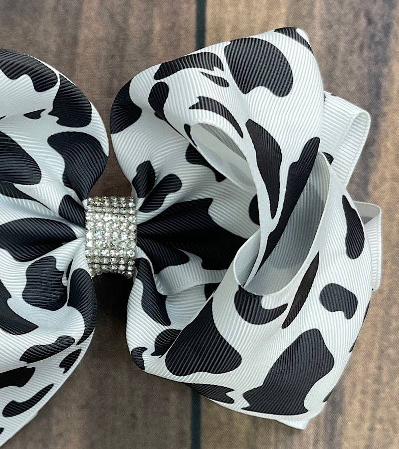 BLACK & WHITE COW SPOTED HAIR BOW. 7.5"